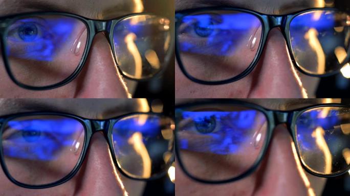 电脑游戏在男人的眼镜上的特写