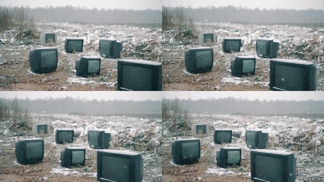 垃圾场的电视坏了，飘着雪