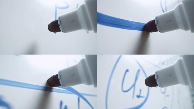 用手握住蓝色记号笔的宏观跟随镜头。老师用数学公式在白板上写方程。铅笔连接到相机。抓拍。