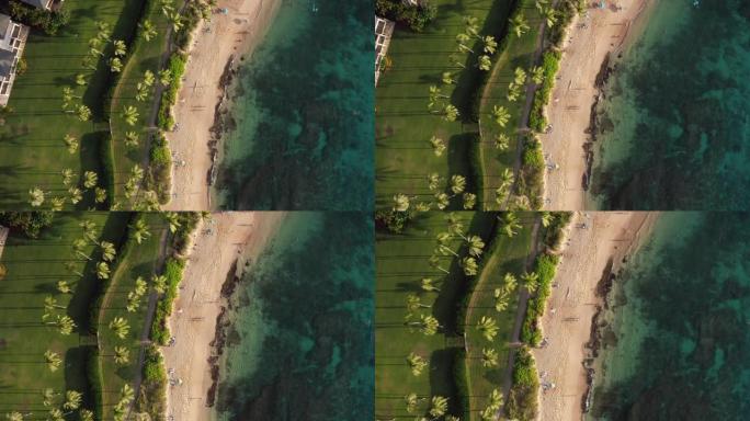 阳光明媚的夏日，夏威夷热带白色沙滩度假胜地的俯视图