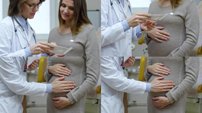 女医生向孕妇解释超声图像