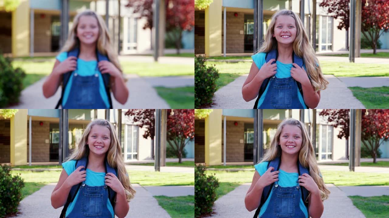 白人女学生在校外微笑着走向镜头