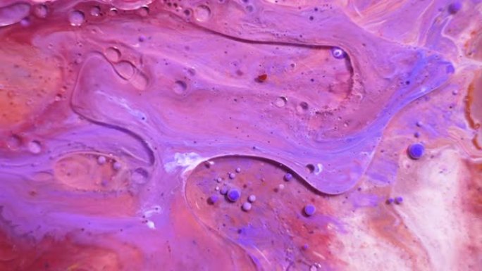 奇妙的彩色气泡结构。混沌运动。抽象彩色油漆。顶视图