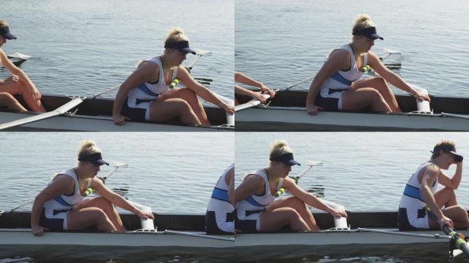 女子赛艇队在河上训练