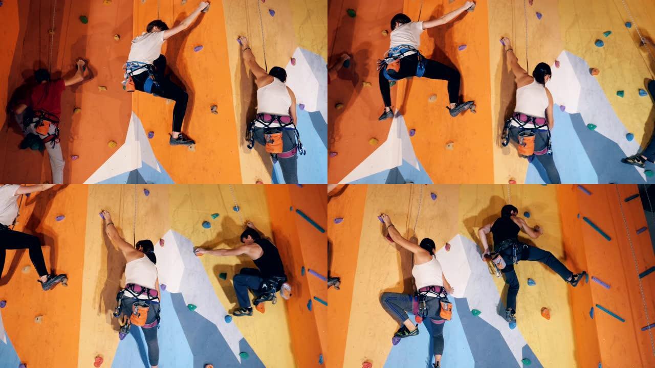 许多登山者在墙上训练，特写镜头。