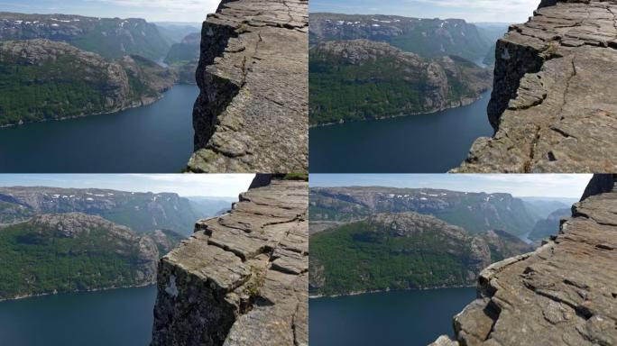 布道者的椅子悬崖悬崖，又名挪威Preikestolen。峡湾在后台。Steadicam shot, 