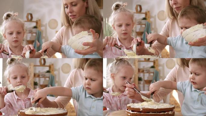 高加索妈妈和孩子们在分层蛋糕上撒上奶油