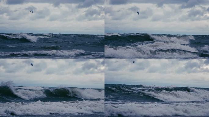 慢动作。人们在海里进行风筝冲浪