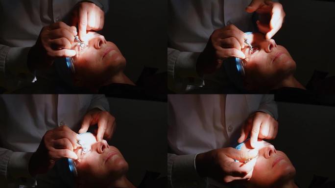 验光师在诊所用眼科测试设备检查患者的眼睛4k