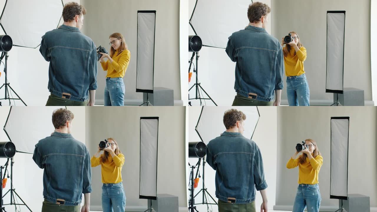 摄影师在摄影棚中使用相机拍摄男模特的慢动作