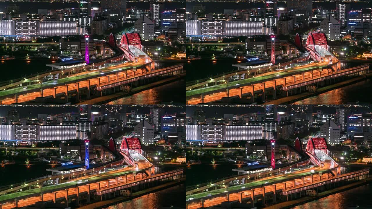延时: 神户港和火车站在夜间到机场的鸟瞰图