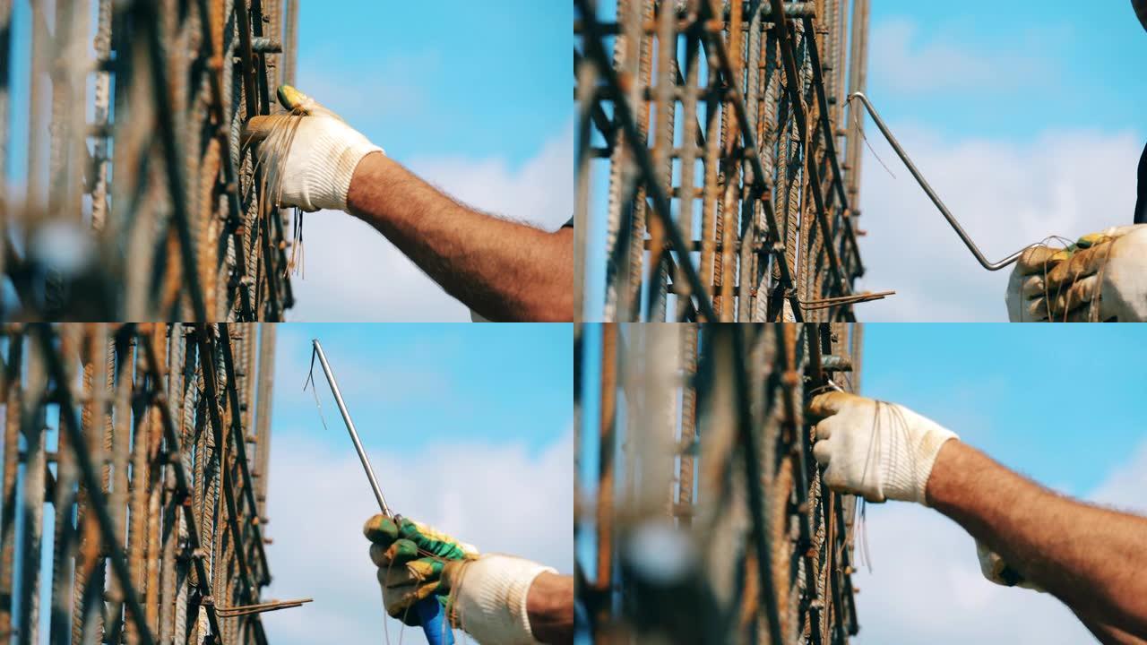 男性建筑商在现场从事金属建筑。