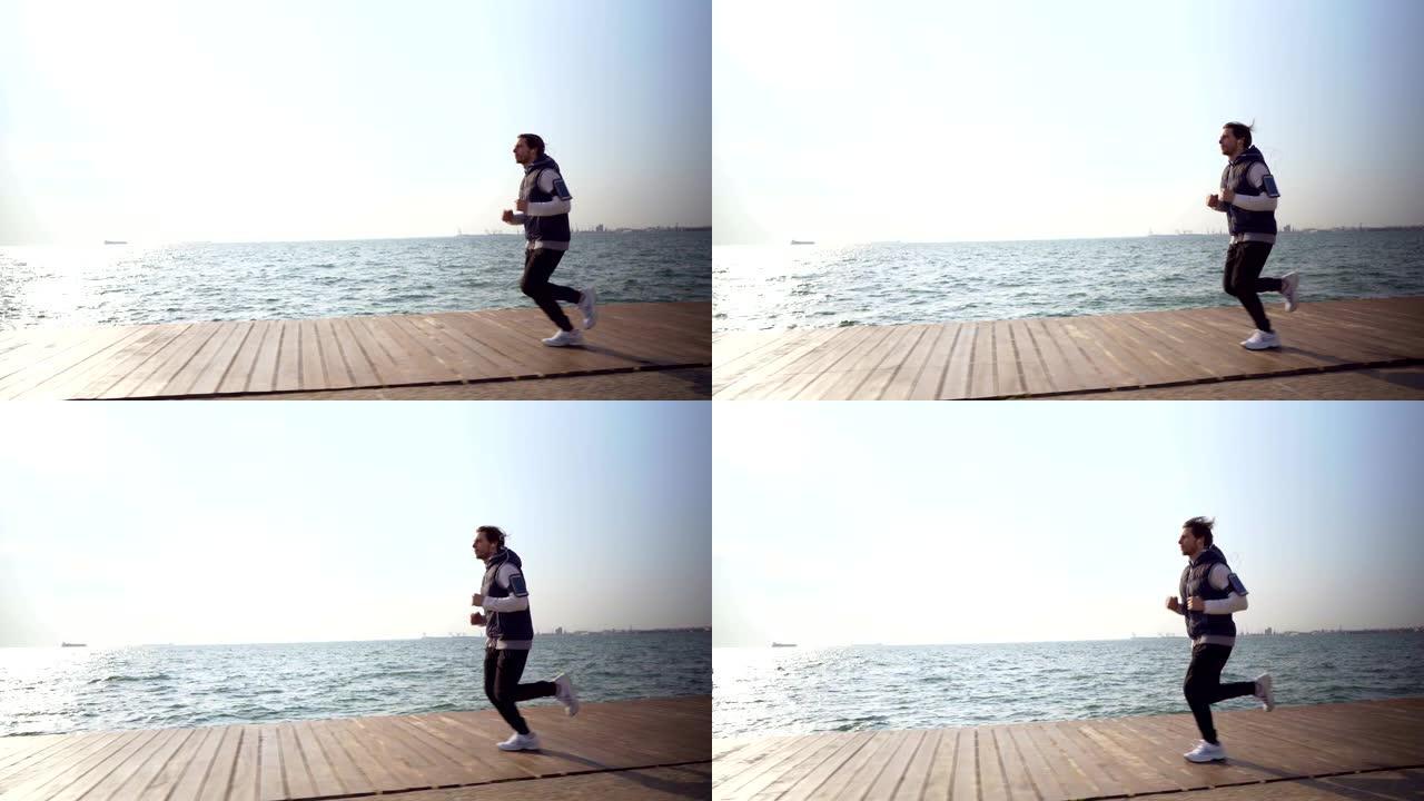男子在海边慢跑