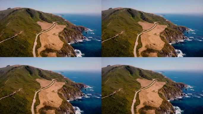 加州大苏尔标志性的1号高速公路和太平洋阳光海岸线全景的惊人背景空中拍摄。