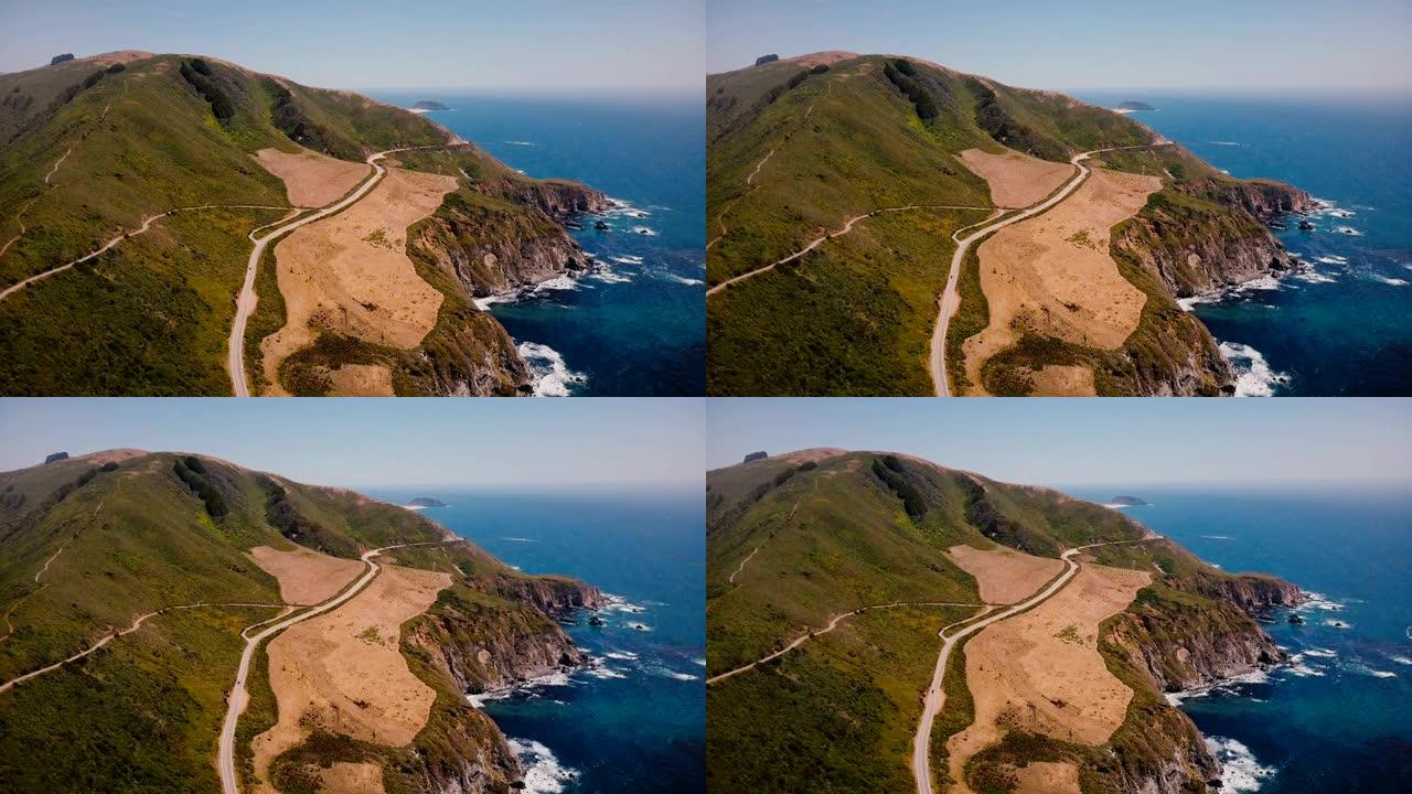 加州大苏尔标志性的1号高速公路和太平洋阳光海岸线全景的惊人背景空中拍摄。