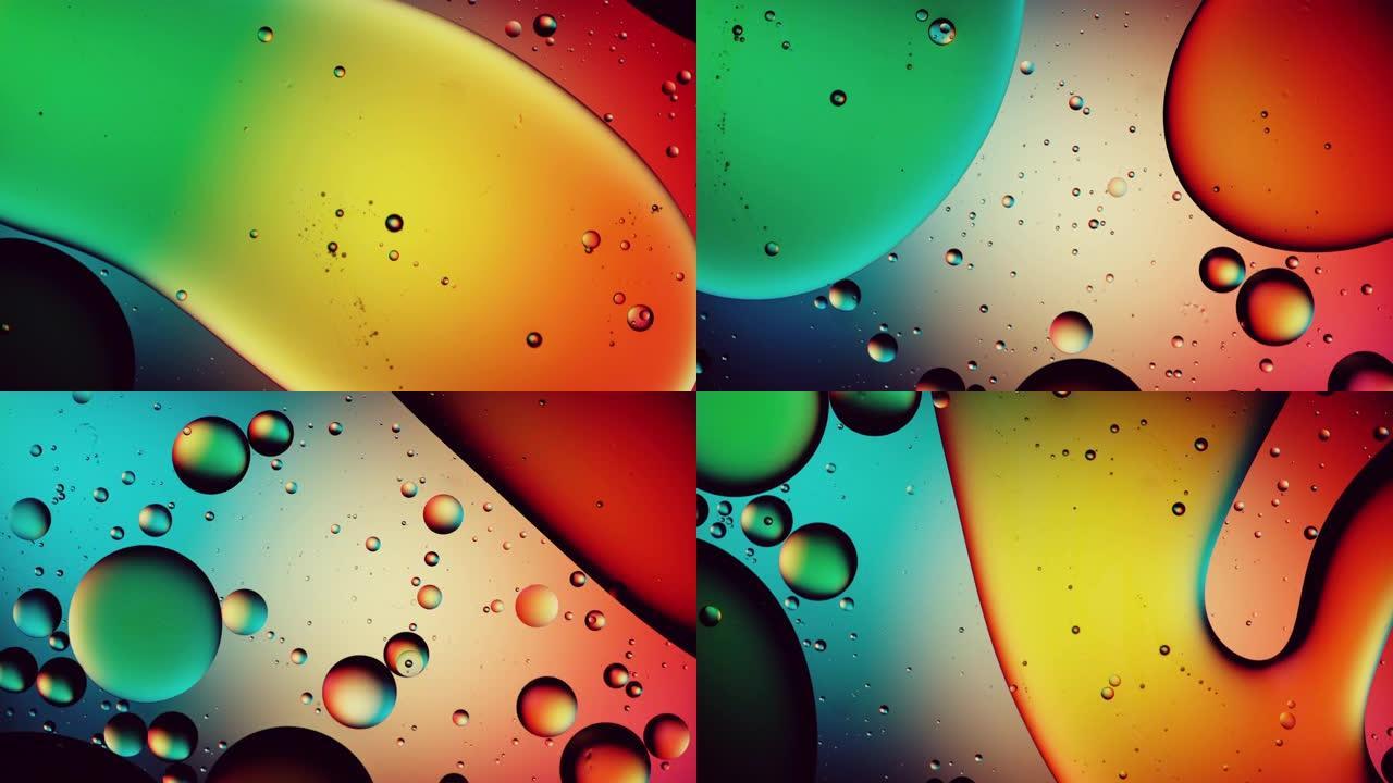 充满活力的彩色背景下水中的油泡