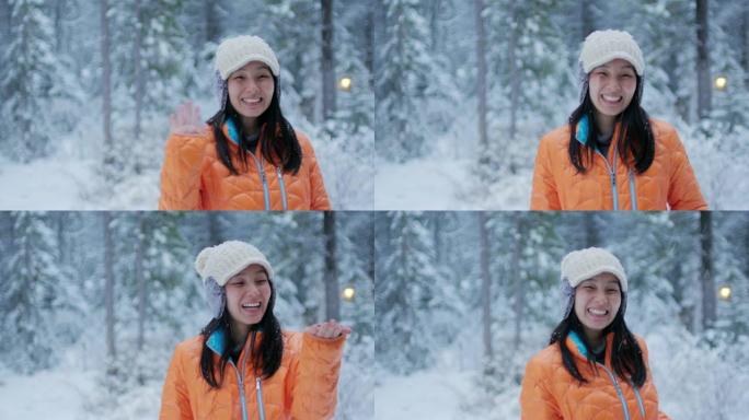享受降雪的女人美女模特带帽子的美女冰天雪