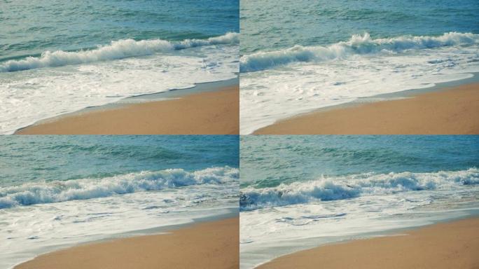 沙滩正被海浪冲刷。慢动作。