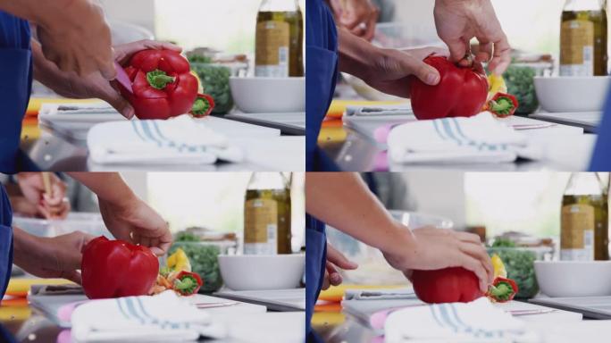 女人在厨房烹饪课上切碎辣椒的特写镜头