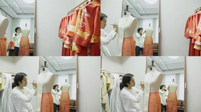 中年中国设计师在裁缝模型上标记图案