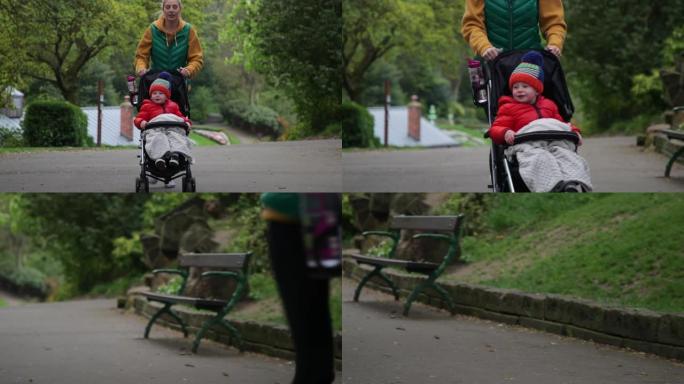 母亲和儿子在公园里奔跑