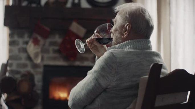 高级男子喝酒喝红酒的外国人退休生活背影男