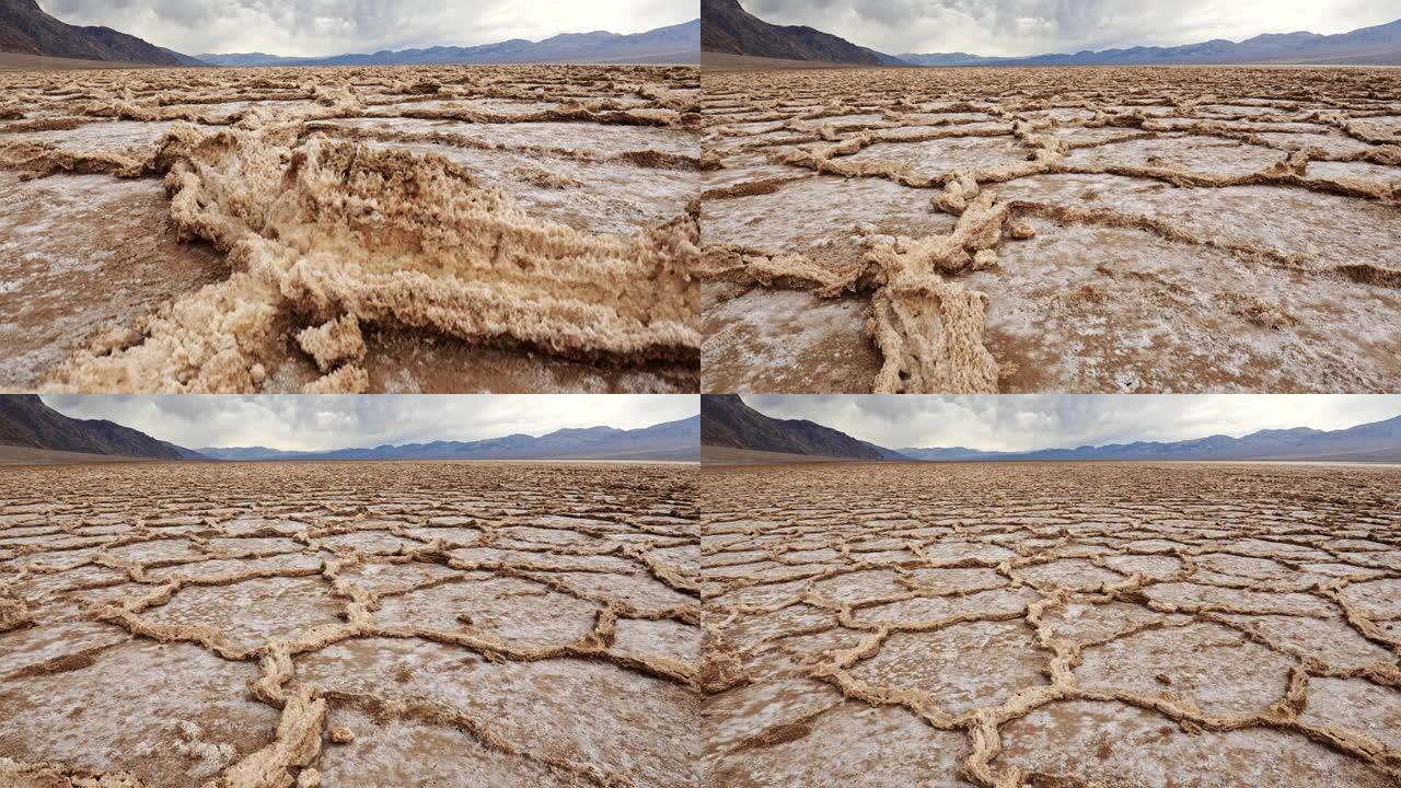 美国死亡谷国家公园。恶水盆地的盐锅。背景中的山脉。Steadicam镜头，4K