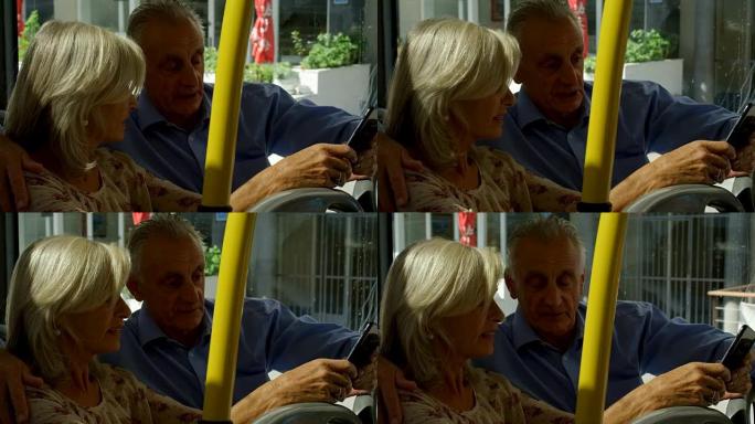 老年夫妇在4k公交车上旅行时用手机自拍