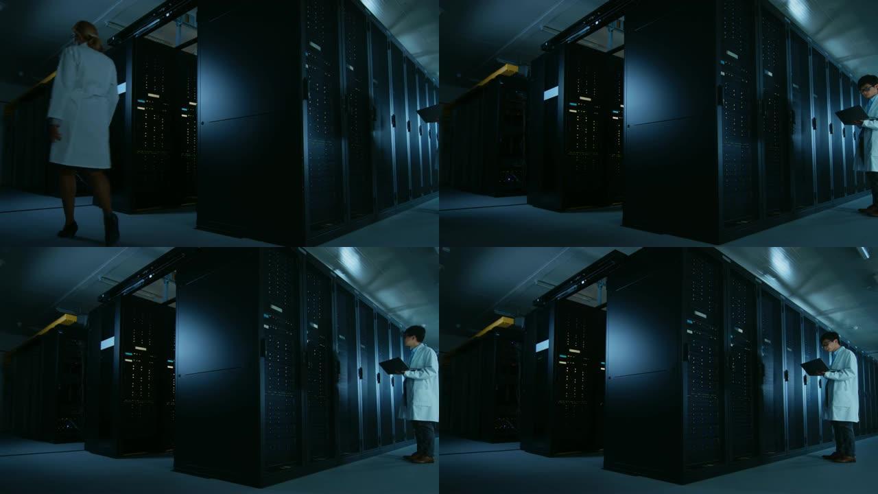 在数据中心: 穿着白大褂的男女IT专家在服务器机架上工作，使用笔记本电脑运行维护诊断。穿着实验室外套