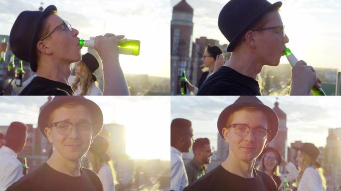 年轻人在屋顶派对上喝啤酒并摆姿势拍照