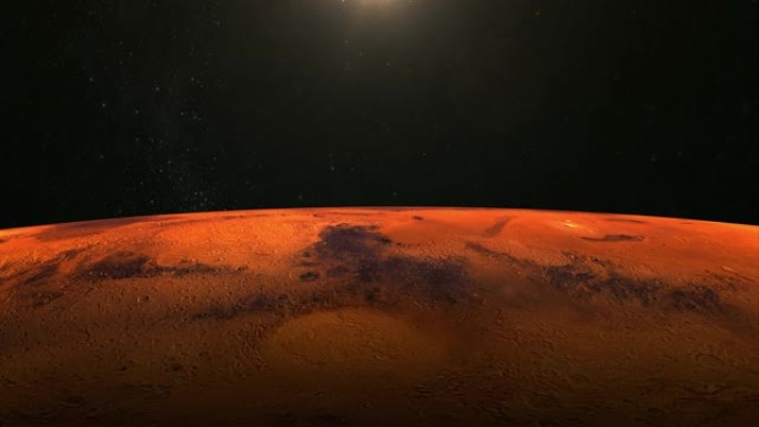 来自太空的火星。星星闪烁。飞越火星。4K.日出。火星缓慢旋转。摄像机向前移动。