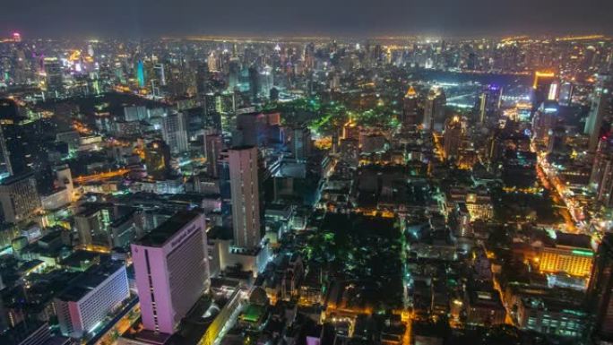 延时和缩小: 曼谷夜间的城市景观。