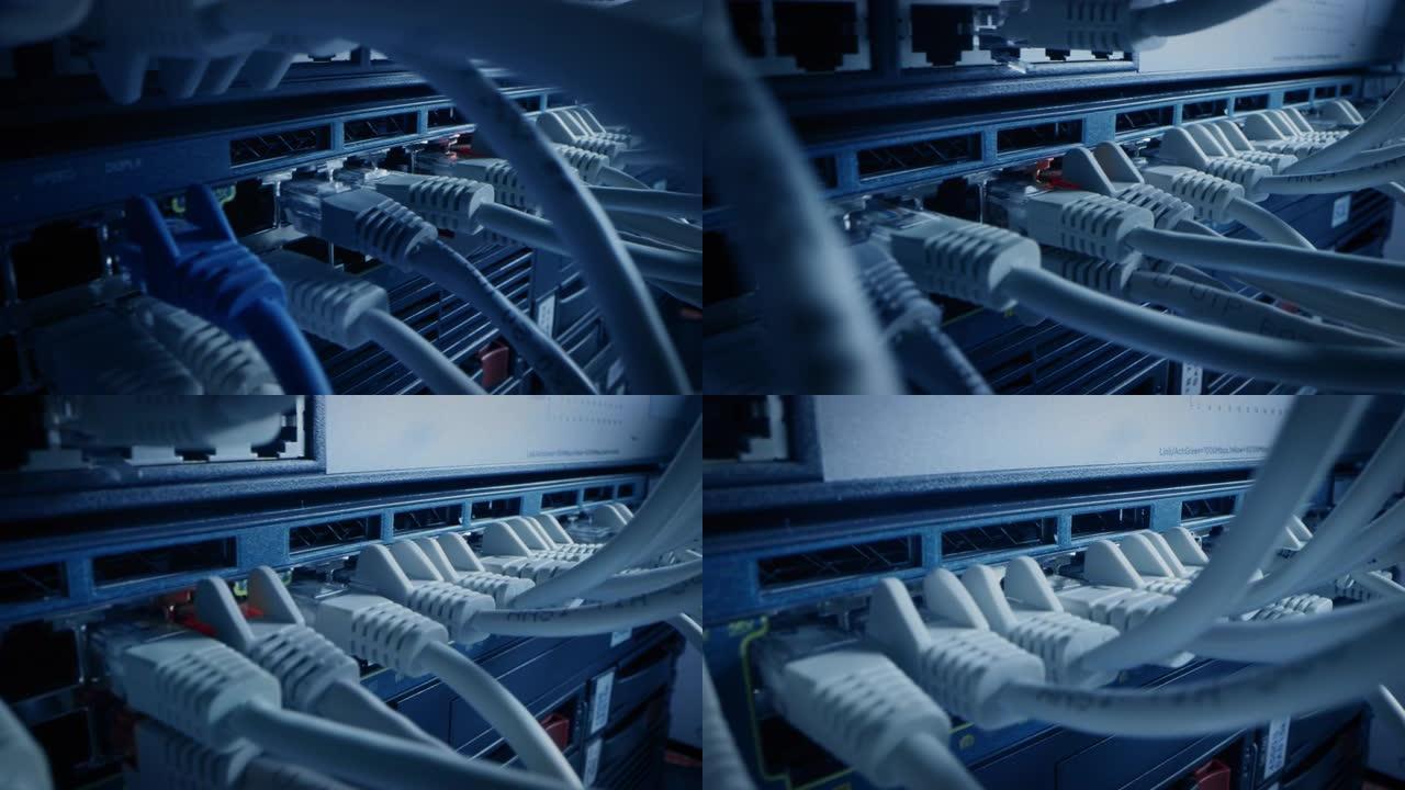 用闪烁的灯连接到路由器端口的特写宏拍摄以太网电缆。电信: RJ45设备连接器插入调制解调器集线器。安