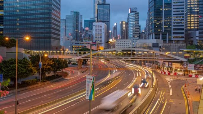 香港市景，中央车站，白天到晚上，现代建筑下道路的交通灯的4k延时场景，