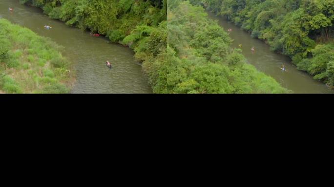 空中: 游客在雨林中进行独木舟旅行。