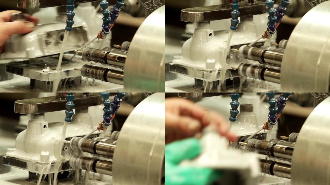 工厂用水射流加工金属件的数控机床。
