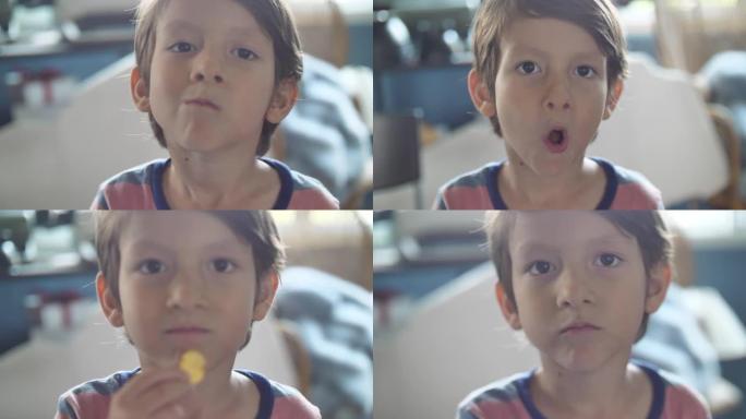 小男孩吃薯片