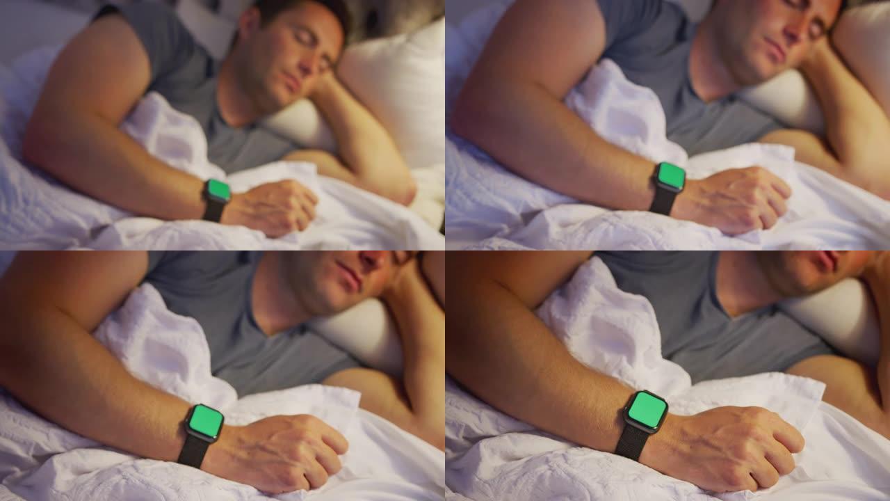 相机放大了戴着智能手表睡在床上的男人
