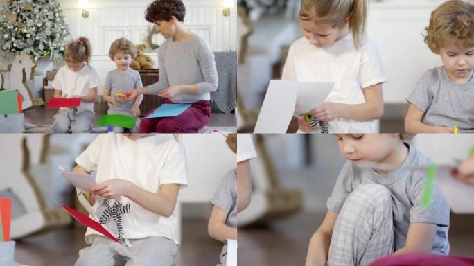 孩子们和妈妈一起制作圣诞纸工艺品的视频汇编