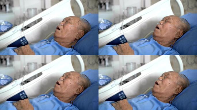 侧视灰发老年男性患者住院睡觉