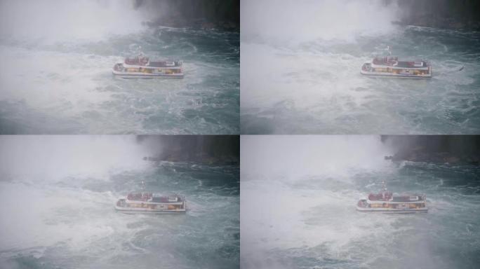 尼亚加拉瀑布8月17日2018旅游游览船靠近瀑布，下降的水雾和薄雾慢动作。