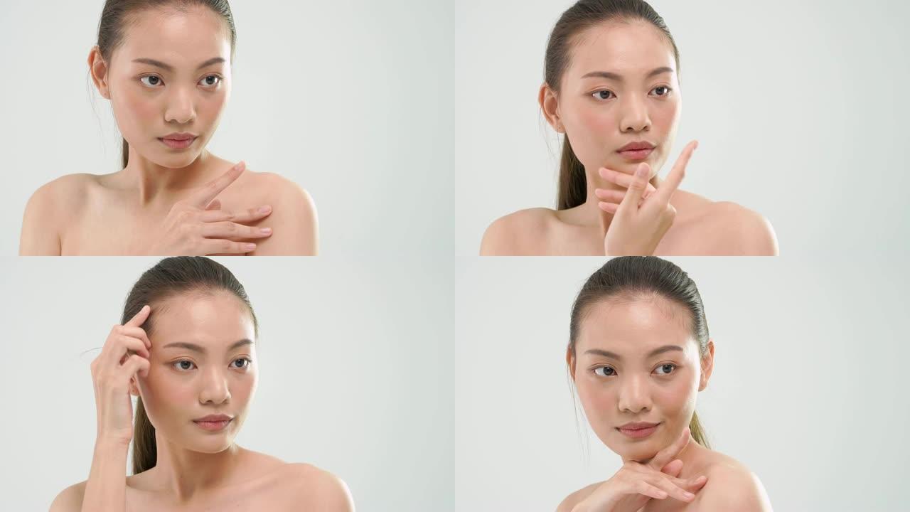 亚洲妇女用美容护肤产品摩擦皮肤在白色的背景。