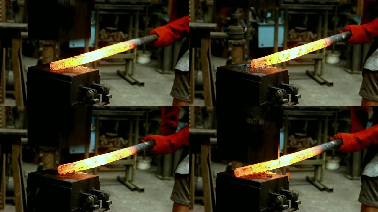 4k机器中的铁匠成型热金属棒