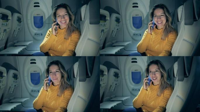 美女在飞机上通电话时很开心