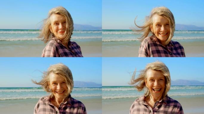 站在海滩上的活跃的白人女性的前视图4k