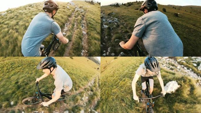 男性运动员山地自行车在山区的草地上骑自行车