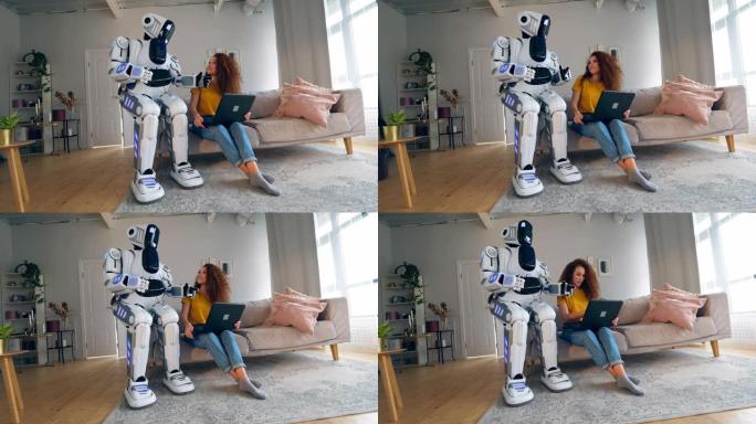 机器人、半机械人与人类概念。一个女孩和一个半机械人在房间里用笔记本电脑工作。