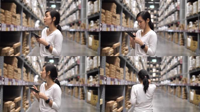 亚洲女性在商务休闲仓库检查用品