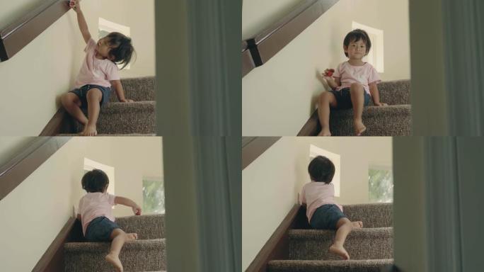小男孩爬上台阶亚裔小朋友富豪豪宅玩耍小汽
