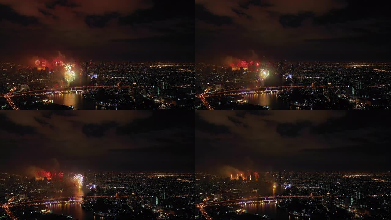 除夕在城市天际线上空的空中无人机视图。城市夜灯庆典。